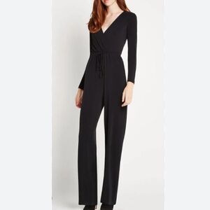 ‎BCBGeneration black surplice jumpsuit. Size xs